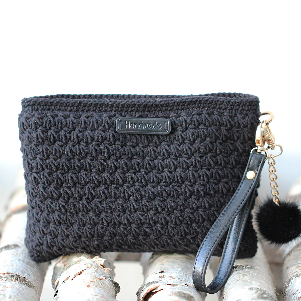 women's clutch with hand strap